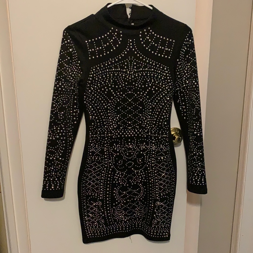 Long sleeve black body con dress